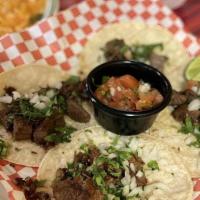 Tacos De Lengua · Three four tortillas or four corn tortillas with grilled chicken, served with rice beans, Pi...