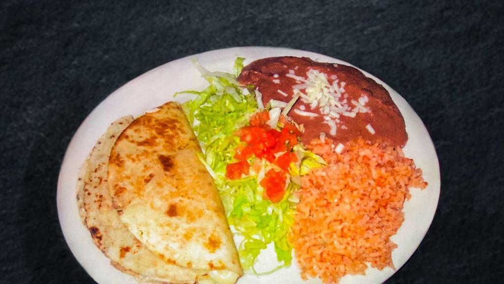 Quesadillas (2) · With choice of spinach or mushroom. Served with Pico de Gallo lettuce, sour cream.