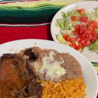 *Steak Ranchero · Grilled steak with rice, beans, flour tortillas & guacamole salad.