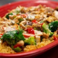 Arroz Con Pollo · Rice with chilled chicken, bell peppers, onions, tomatoes, topped with cheese sauce.