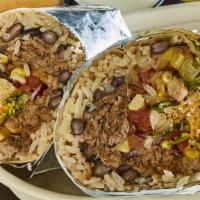Beef Desmenuzado Burrito · Shredded beef with tomatoes, onions, and red wine. Served with shredded Romaine lettuce, bea...
