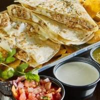 Beef Carne Asada Quesadilla · Angus steak marinated for days and seared to lock in those awesome flavors. Served in a gril...