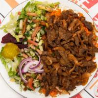 Lamb & Beef Shawarma Large Bowl · Thinly sliced flame roasted lamb & beef. Served with rice, salad (lettuce, pickles, turnip, ...