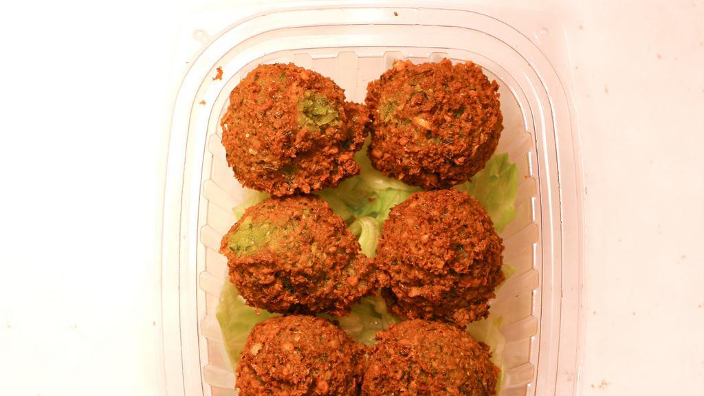 Falafel Balls · Ground chickpeas, vegetables, herbs and middle-eastern spices.