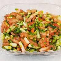 Cucumber Tomato Salad · Tomatoes, cucumber, parsley, red onions and sumac.