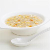 Sweet Corn Soup · It is creamy textured soup made with sweet corn topped with Indian herbs.