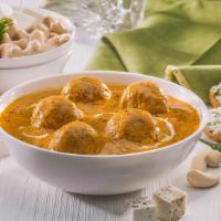 Malai Kofta · Fried dumpling balls made up of mava cooked in cashew nut gravy. Come with Rice