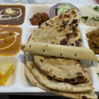 Delux Thali · Bikanervala favorite: Thali is served in combination of one naan, one parantha, dal makhani,...
