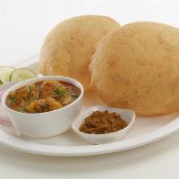 Aloo Subji With Puri · Deep fried whole wheat bread served with potato gravy.