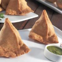 Samosa Plate · A famous Indian snacks, fried or baked with a savory filling such as spiced potatoes, onions...