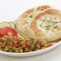 Matar Kulcha · It is the combination of flat refined flour bun served with boiled dry peas masala mixed wit...