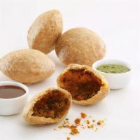 Dal Kachori · Two pieces. Small, crispy deep fried whole wheat bread puri filled with spiced moong lentils...