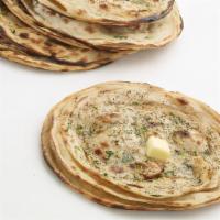 Lachha Parantha · Multi layered flatbread made of whole wheat flour.