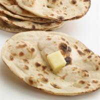 Tandoori Butter Roti · A light, flat, unleaved crispy bread cooked in oven tandoor.