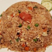 Classic Thai Fried Rice · Jasmine rice, scallion, tomato, onion and egg.