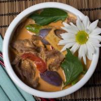 Thai Red Curry · Hot and Spicy. Bamboo shoots, coconut milk, bell peppers, lemon leaves and basil.