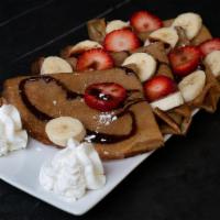 Crepes · Freshly sliced banana, strawberries, topped with Nutella, powdered sugar and whipped cream.