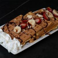 Waffle Baffle · Chocolate batter, strawberry ice cream, vanilla sauce, fresh whipped cream, candied walnuts,...