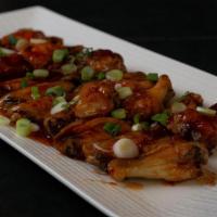 Sweet Chili Glazed Chicken Wings · Wings dipped in our heavy sticky sweet and chili sauce.