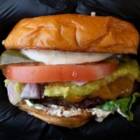 American Burger · Single patty with American cheese, lettuce, pickles, tomatoes and onions.