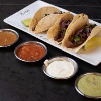 Steak Taco Blast · Ari's homemade soft chili tacos made with our special beef steak topped with freshly chopped...