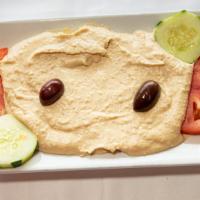 Hummus · Homemade chickpea dip served with pita bread. vegan.