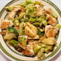 Chicken Mediterranean · Marinated grilled chicken with broccoli and artichokes in a lemon sauce. served over rice. s...