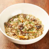 Mushroom Risotto · porcini, hedgehog and baby bella mushrooms, parmigiano, butter, chives