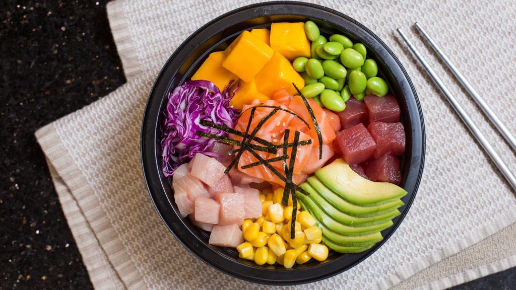 Ichiban Poke Bowl · Salmon, tuna, yellowtail, brown rice, mango, avocado, edamame, topped with furikake, seaweed flakes, and yuzu ponzu sauce.