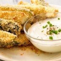Fried Zucchini · Delicious Zucchini, spiced, and fried to golden perfection.