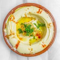 Hummus · Vegetarian. Chick peas dip with tahini garlic and juiced lemon.