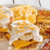 Southern Fried Chicken Biscuit Breakfast · A fried chicken fillet and cheddar cheese inside two fresh baked biscuits. Topped with cream...