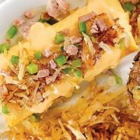 Granny'S Country™ · Filled with diced grilled ham, onions, green peppers, American cheese, cheese sauce, and cri...
