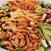 Southwest Avocado Salad · A fresh mex salad with blackened chicken, black bean corn relish, American cheese, and fresh...