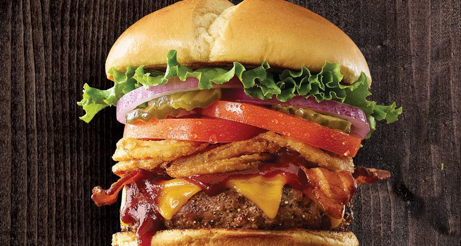 Bbq Tangler Burger · A blend of BBQ sauce, Cheddar cheese, Applewood smoked bacon, crunchy onion tanglers, lettuce, tomato, sweet red onions, and pickles on a warm brioche bun. Includes choice of side.