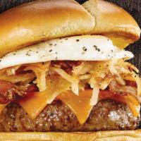 The Breakfast Burger · Crispy seasoned hash browns, applewood smoked bacon, cheddar cheese, and a fried egg on a wa...