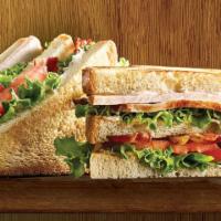 Triple Decker Club · Butterball® oven-roasted turkey, applewood smoked bacon, tomato, lettuce, and mayo on white ...