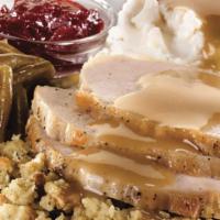 Butterball® Turkey & Dressing · Oven-roasted slices on sage dressing with hearty turkey gravy and cranberry sauce. Served wi...