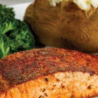 Grilled Salmon · Flaky, tender fillet Cajun or garlic seasoned and teriyaki glazed. Served with 2 dinner sides.