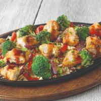 Hibachi Chicken · Teriyaki glazed fried chicken, stir fried with red bell peppers, red onions and broccoli, se...