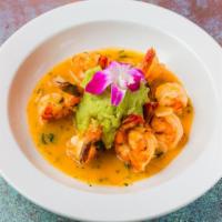 Camarones Al Ajillo · Sautéed jumbo shrimp with fresh roasted garlic chilean sauvignon blanc, fresh herbs. Served ...