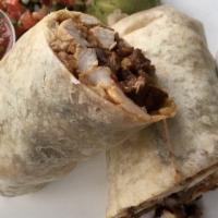 Azteca Burrito · A combination of grilled chicken, hanger steak, mayan shrimp, rice, black beans, chihuahua m...