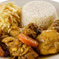 Curry Chicken  · Served with white rice or rice and peas also your choice of steam vegetables or fresh salad