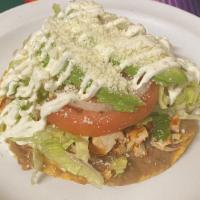 Tostadas · Servido con lechuga, tomate, cebolla, aguacate, crema agria y queso. / Served with lettuce, ...