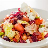 Chopped Salad · House roasted beets, chickpeas, onion, lettuce, tomato, house roasted peppers and Greek feta...
