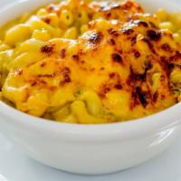 Purbird Mac 'N Cheese · Made with three cheeses. Creamy, crispy, and delicious.