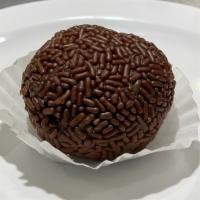 Brigadeiro · Chocolate ball made with cocoa and sweetened milk, covered with chocolate sprinkles.