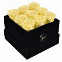 Forever Roses Yellow Square Box · Each forever rose box is handcrafted.
All forever roses last a year.  
This yellow rose bouq...