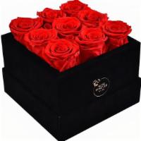 Forever Rose Red Square  · Each forever rose box  is handcrafted.
All forever roses last a year.  
This red rose bouque...