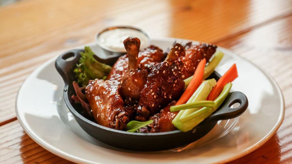 Wings · 6 or 12pc wings, with choice of spicy BBQ, buffalo, or teriyaki sauce. Served with carrots, celery, and bleu cheese dipping sauce.